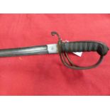 A VICTORIAN ROYAL ARTILLERY OFFICER'S SWORD WITH A SINGLE EDGED BLADE, 86 cms LONG AND ETCHED WITH