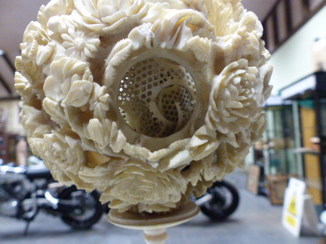 A CHINESE IVORY PUZZLE BALL CARVING WITH STAND HAVING A ROTATING RETICULATED KNOP AND A FURTHER - Image 19 of 20