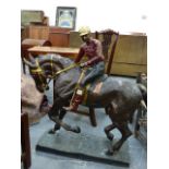 A LARGE BRONZE FIGURE OF A HORSE AND JOCKEY AFTER THE 19th.C.ORIGINAL. H.100cms.