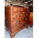 A GEORGIAN MAHOGANY CHEST OF TWO SHORT AND THREE GRADUATED LONG DRAWERS ON BRACKET FEET.