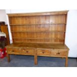 A 19th.C.AND LATER PINE KITCHEN/ SCULLERY DRESSER WITH FOUR DRAWERS AND ASSOCIATED PLATE RACK