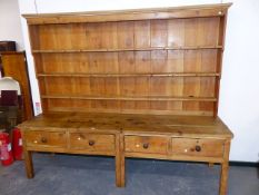 A 19th.C.AND LATER PINE KITCHEN/ SCULLERY DRESSER WITH FOUR DRAWERS AND ASSOCIATED PLATE RACK