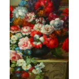 A DECORATIVE OIL PAINTING OF SUMMER FLOWERS, SIGNED OIL ON BOARD. 61 x 50cms.