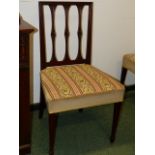 A SET OF SIX GEO.III. CARVED MAHOGANY DINING CHAIRS WITH NEEDLEWORK SEATS. (6)