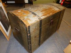 A VICTORIAN PAINT DECORATED PINE DOME TOP BLANKET BOX WITH IRON CARRYING HANDLES. W.86cms.