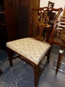 A SET OF FOUR ANTIQUE MAHOGANY DINING CHAIRS OF CHIPPENDALE DESIGN WITH CARVED SQUARE FORELEGS