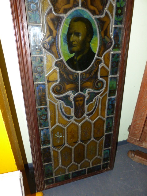 AN OLD STAINED GLASS LEADED PANEL LATER MOUNTED IN A WOODEN FRAME. 67 x 204cms. - Image 4 of 7