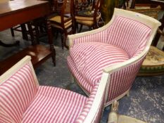 A PAIR OF FRENCH DIRECTOIRE STYLE TUB FORM ARMCHAIRS WITH FEATHER FILLED LOOSE CUSHIONS.