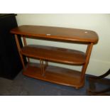 AN ERCOL PALE ELM THREE TIER STAND ON CASTORS. W.91 x H.71cms.