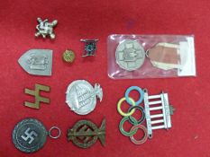 THIRD REICH LUFTSCHUTZ MEDAL, SOCIAL WELFARE MEDAL, COPY BERLIN OLYMPICS PLAQUE AND SEVEN FURTHER