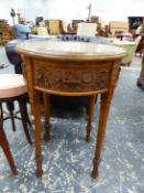 AN INTERESTING CIRCULAR WALNUT OCCASIONAL TABLE WITH FOUR CARVED FRIEZE PANELS OVER SQUARE TAPERED