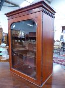 A SMALL 19th.C.MAHOGANY GLAZED DOOR WALL CABINET WITH ARMORIAL CREST TO THE GLASS. 46 x 26 x H.