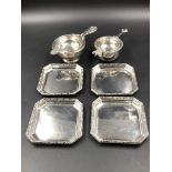 TWO SILVER HALLMARKED TEA STRAINERS COMPLETE WITH BOWLS AND FOUR SILVER HALLMARKED DRIP TRAYS. GROSS