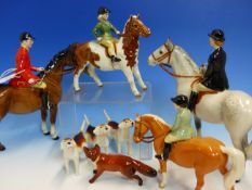 A BESWICK HUNTING GROUP COMPRISING: HUNTSMAN. H 21.5cms. HUNTING MOTHER, TWO CHILDREN, FOUR HOUNDS