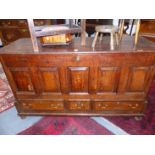 A LATE GEORGIAN COUNTRY OAK MULE CHEST WITH PANELLED FRONT OVER TWO DRAWERS. 147 x 56 x H.83cms.