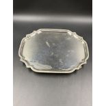 A SILVER HALLMARKED FOOTED TRAY WITH GADROON RECTANGLE SHAPED RIM, BEARING THE 1952 CORONATION