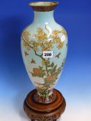 A JAPANESE CLOISONNE BALUSTER VASE WORKED WITH BIRDS AND FLOWERS ON A SKY BLUE GROUND, WITH WOOD