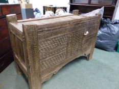 AN INTERESTING, POSSIBLE AFGHAN, CARVED HARDWOOD HUTCH CUPBOARD ON STILE SUPPORTS. 122 x 49 x