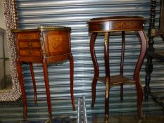 A PAIR OF FRENCH INLAID OVAL TWO TIER SIDE TABLES WITH DRAW DECORATED WITH GILT BRASS MOUNTS.