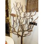 AN INTERESTING WROUGHT IRON TREE SCULPTURE WITH CANDLE HOLDERS. H.180cms.