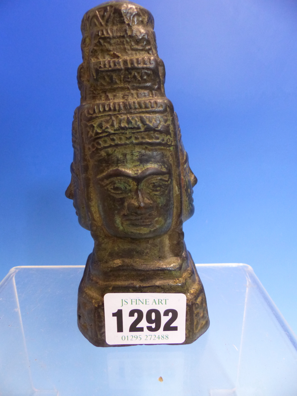 A BRONZE OF THE FOUR FACED BRAHMA WEARING A THREE STEPPED CROWN. H 13cms.