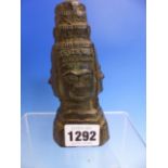 A BRONZE OF THE FOUR FACED BRAHMA WEARING A THREE STEPPED CROWN. H 13cms.