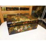 A MID 19th.C.FLORAL PAINTED BLACK PAPIER MACHE DRESSING BOX, THE INTERIOR WITH ONE BOTTLE AND LIFT