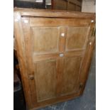 A 19th.C.PINE CORNER CABINET WITH SINGLE FOUR PANEL DOOR. W.104 x H.108cms.