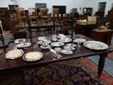 A LARGE COLLECTION OF SILVER PLATED WARE TO INCLUDE TUREENS, SERVING TRAYS, COFFEE POT, CHEESE BOARD