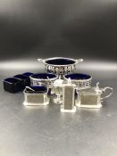 A SILVER HALLMARKED SUGAR BOWL, A PAIR OF VICTORIAN SILVER SALTS, A SILVER CRUET SET AND A FURTHER