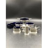 A SILVER HALLMARKED SUGAR BOWL, A PAIR OF VICTORIAN SILVER SALTS, A SILVER CRUET SET AND A FURTHER