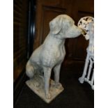 A PAIR OF COMPOSITE STONE FIGURES OF SEATED DOGS. H.70cms.