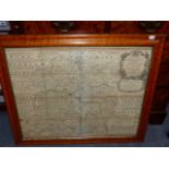AN ANTIQUE HAND COLOURED MOUNTED FOLDING MAP OF SHROPSHIRE BY EMANUEL BOWEN, IN MAPLE FRAME. 54 x