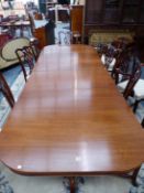 A BRIGHT'S OF NETTLEBED CHIPPENDALE STYLE MAHOGANY DINING TABLE WITH TWO LEAVES, THE ROUNDED