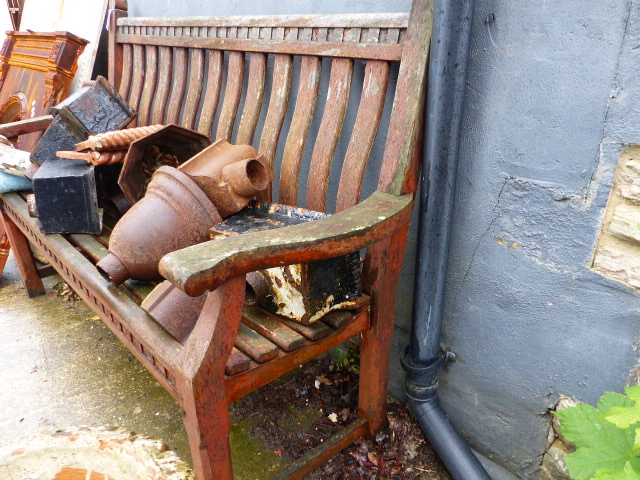 A TEAK GARDEN BENCH.