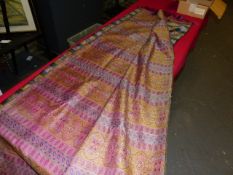 A SILK SINGLE SIDED PAISLEY SHAWL MACHINE WOVEN WITH BANDS OF QUATREFOILS, BLUE AND MAUVE LEAVES,