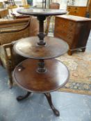 AN ANTIQUE MAHOGANY THREE TIER DUMB WAITER ON TRIPOD WITH LONG NOSED CLUB FEET. H.110cms.