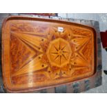 A STAR INLAID YEW WOOD ROUNDED RECTANGULAR TRAY. 56.5 x 35cms.