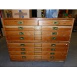 A VINTAGE EIGHT DRAWER, TWO PART PLAN CHEST ON PLINTH BASE. 122 x 87 x H.90cms.