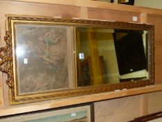 A RECTANGULAR BEVELLED GLASS MIRROR IN GILT FRAME, THE RIBBON CRESTING ABOVE A PRINT LE JEU DE