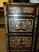 AN INTERESTING ORIENTAL HARDWOOD DESK WITH MOTHER OF PEARL INLAY DECORATION TO THE PANEL BACK AND