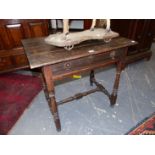 A GEORGIAN OAK SIDE TABLE WITH SINGLE DRAWER ABOVE BALUSTER LEGS JOINED BY H-STRETCHER ABOVE PAD