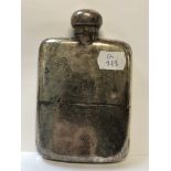 AN EDWARDIAN SILVER HALLMARKED HIP FLASK WITH GILDED INNER AND REMOVABLE BOTTOM CUP WITH HINGED