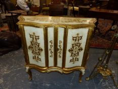 AN ITALIANATE WHITE AND GILT SERPENTINE FRONT TWO DOOR SIDE CABINET ON CABRIOLE LEGS. W.100 x D.40 x