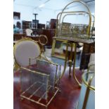 TWO BRASS MOUNTED MESH MAGAZINE RACKS, EACH OF TWO COMPARTMENTS, THE TALLER ON THREE LEGS. H.75 &