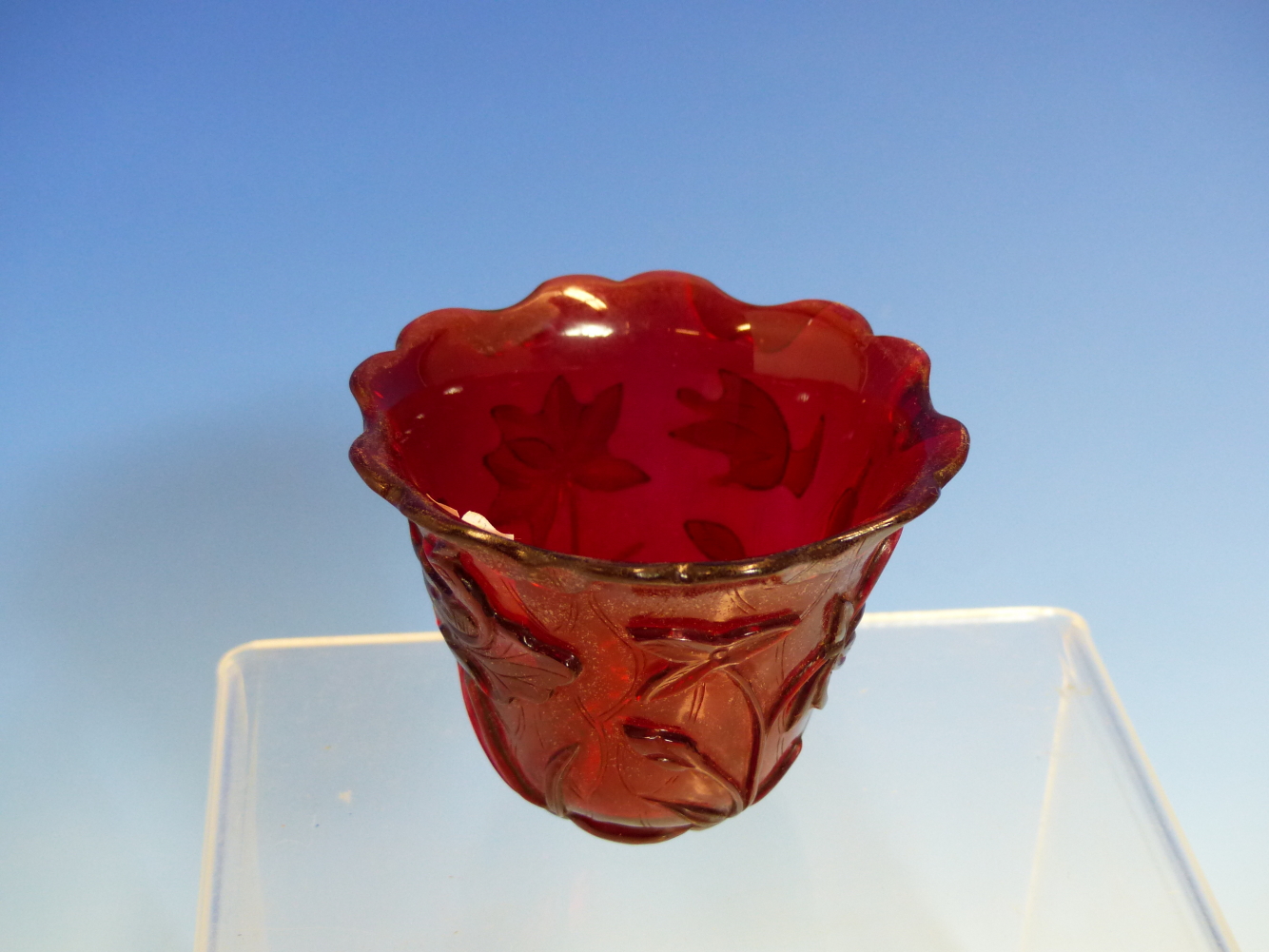 A PEKING RUBY GLASS CUP, THE EXTERIOR CARVED AND SHAPED AS A LOTUS LEAF WITH BIRDS AND FOLIAGE. H - Image 2 of 11