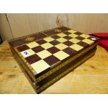 A LEAD PART CHESS SET AND INLAID FOLDING BOARD, THE PIECES REPRESENTING THE BRITISH AND FRENCH