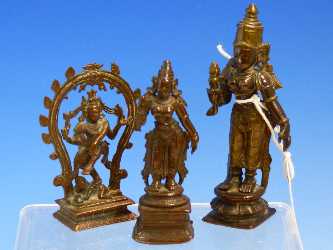 THREE VARIOUS INDIAN BRONZE FEMALE DEITIES, THE TALLEST H.12cms. (3)