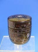 A CHINESE LAC BURGAUTE BOX AND COVER THE CYLINDRICAL FORM ROUNDING INTO THE FOOT, THE SIDES INLAID