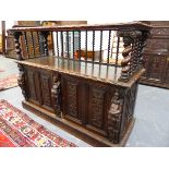 AVICTORIAN OAK BUFFET, THE GADROON EDGED TOP RAISED ON BARLEY TWIST COLUMNS ABOVE A CUPBOARD BASE